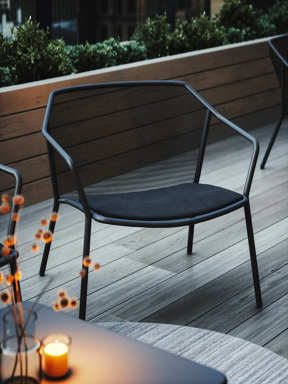 EMU: Outdoor Furniture Above Manhattan at Dusk — detail