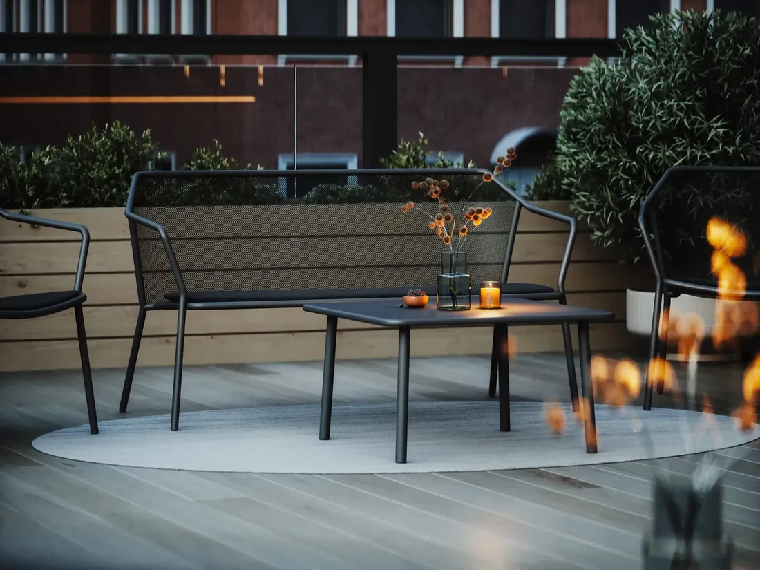EMU: Outdoor Furniture Above Manhattan at Dusk